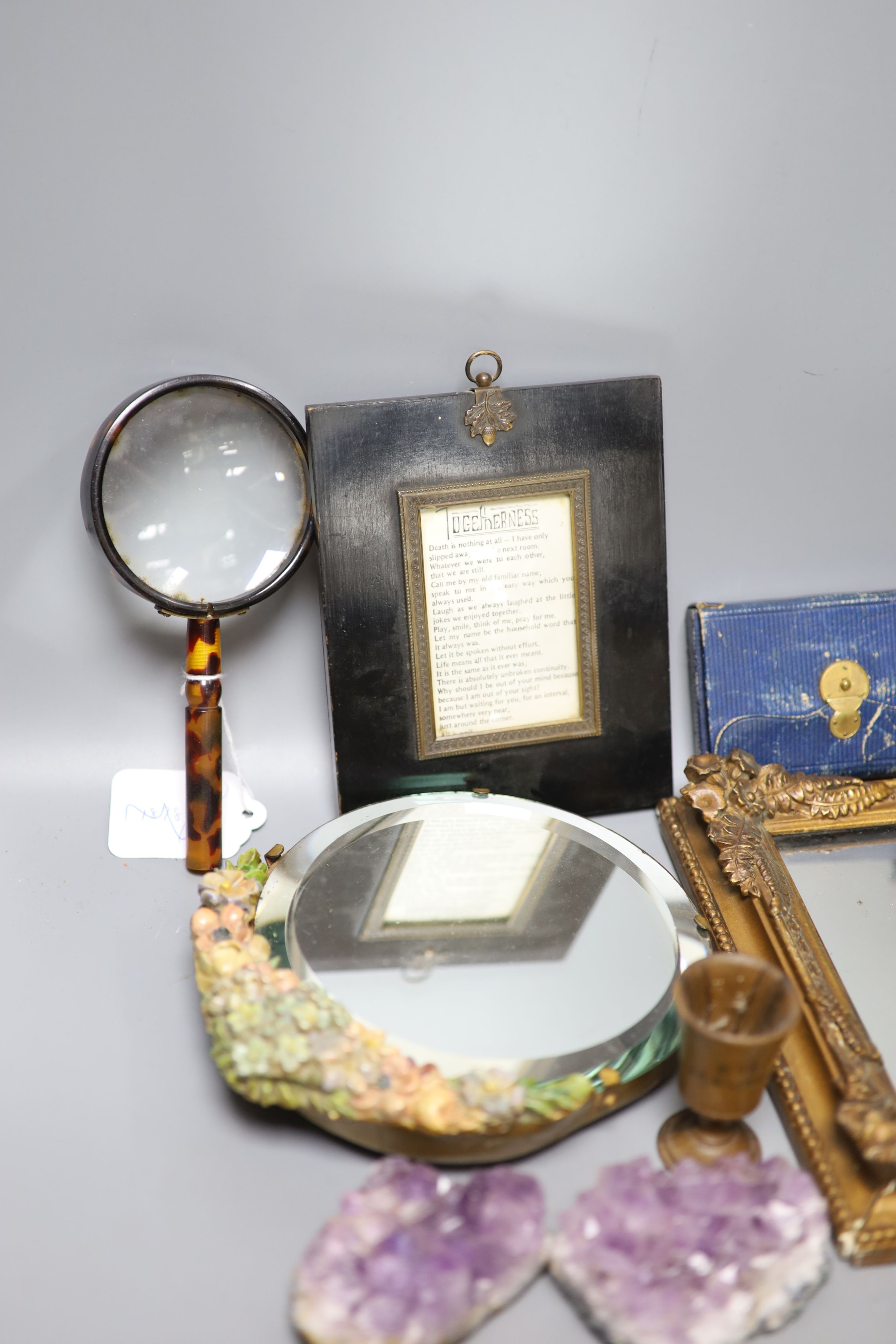 A group of objects of vertu, various frames, magnifying glasses etc.